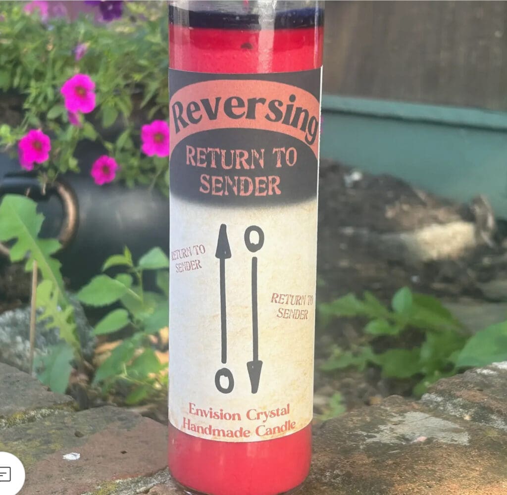 A red candle labeled 'Reversin' with a return to sender theme.