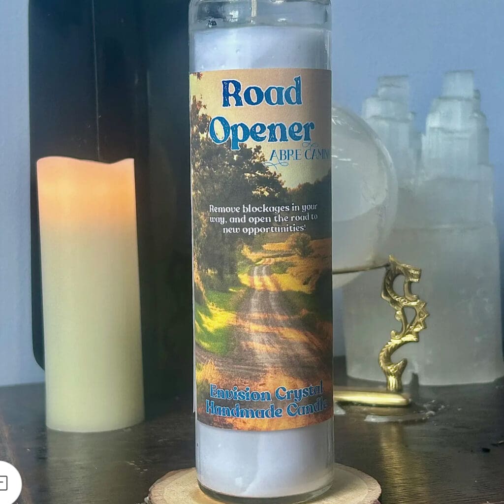 A candle labeled 'Road Opener' with a glowing candle and decorative items nearby.
