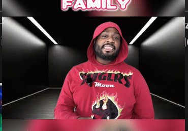 Man in red hoodie with welcoming text.